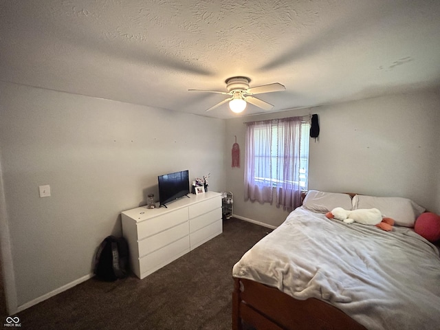 5174 S Greensboro Pike, Knightstown, IN 46148 - bedroom featuring dark carpet, baseboards, a ceiling fan, and a textured ceiling