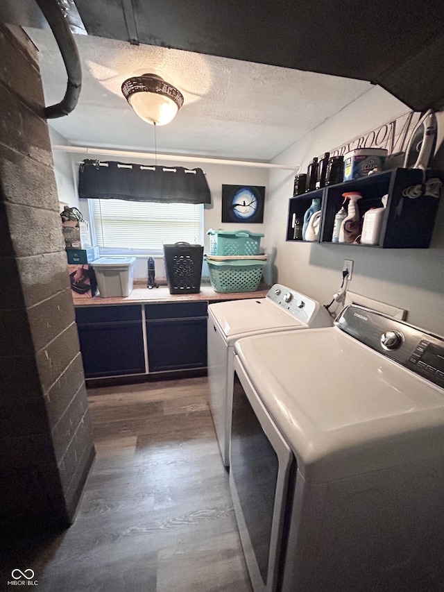5174 S Greensboro Pike, Knightstown, IN 46148 - laundry room featuring separate washer and dryer, wood finished floors, and a textured ceiling
