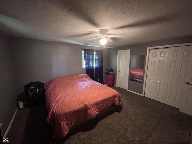 5174 S Greensboro Pike, Knightstown, IN 46148 - bedroom featuring dark carpet, ceiling fan, and a textured ceiling