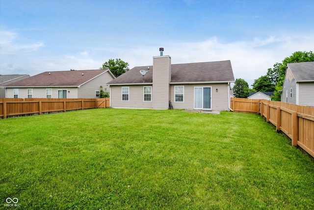 5258 Brassie Dr, Indianapolis, IN 46235 - back of house featuring a chimney and roof with shingles