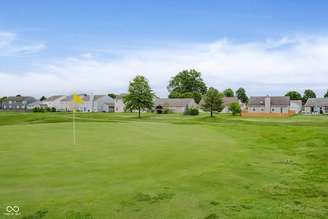 5258 Brassie Dr, Indianapolis, IN 46235 - view of community featuring a residential view, a putting green, and a lawn