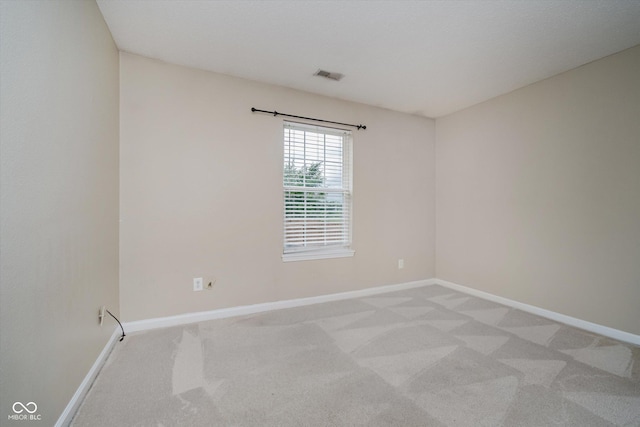 5258 Brassie Dr, Indianapolis, IN 46235 - spare room featuring light carpet and baseboards