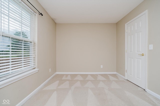 5258 Brassie Dr, Indianapolis, IN 46235 - unfurnished bedroom featuring light carpet and baseboards