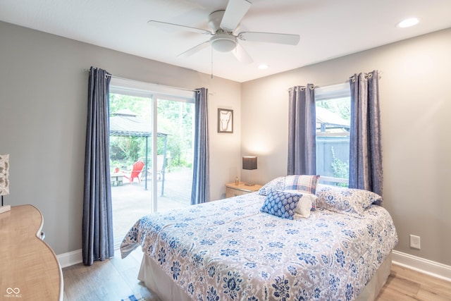 5315 Camden St, Indianapolis, IN 46227 - bedroom with light wood-type flooring, access to exterior, baseboards, ceiling fan, and recessed lighting