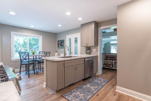 5315 Camden St, Indianapolis, IN 46227 - kitchen featuring stainless steel dishwasher, a sink, gray cabinetry, recessed lighting, and baseboards