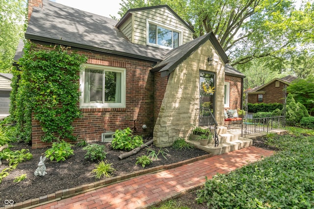 5315 Camden St, Indianapolis, IN 46227 - english style home with roof with shingles and brick siding