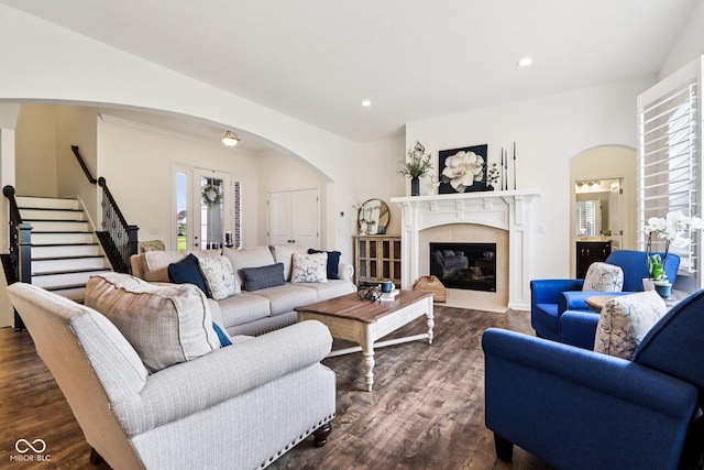 1521 Avondale Dr, Westfield, IN 46074 - living area featuring arched walkways, stairs, plenty of natural light, dark wood-type flooring, and recessed lighting