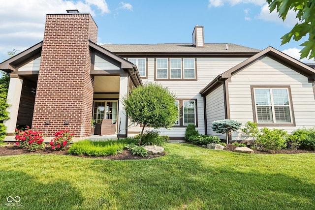 1521 Avondale Dr, Westfield, IN 46074 - view of front of home with a chimney and a front lawn