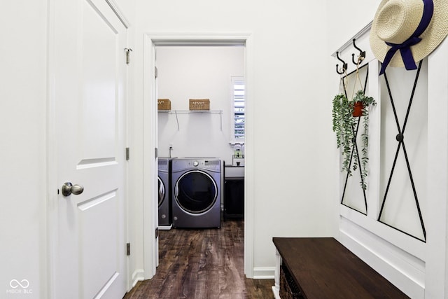 1521 Avondale Dr, Westfield, IN 46074 - washroom featuring washing machine and dryer, dark wood finished floors, and baseboards