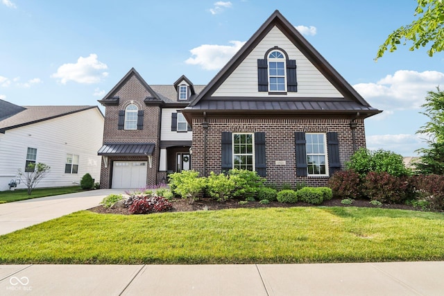 1521 Avondale Dr, Westfield, IN 46074 - view of front of house with brick siding, a standing seam roof, concrete driveway, and a front lawn