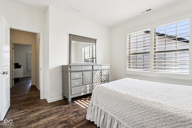1521 Avondale Dr, Westfield, IN 46074 - bedroom with dark wood-style floors and baseboards