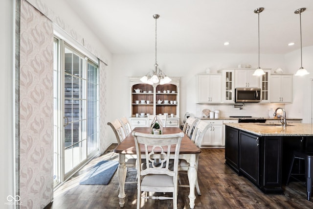 1521 Avondale Dr, Westfield, IN 46074 - dining area featuring dark wood-type flooring, a chandelier, and recessed lighting