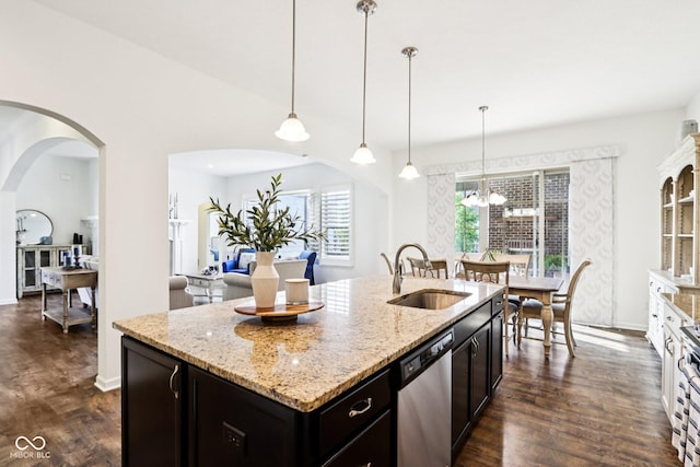 1521 Avondale Dr, Westfield, IN 46074 - kitchen featuring a sink, stainless steel appliances, dark wood-style floors, light stone counters, and a chandelier