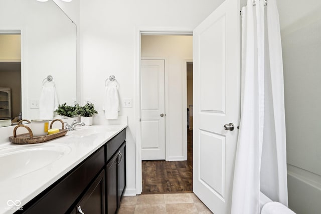 1521 Avondale Dr, Westfield, IN 46074 - full bathroom with double vanity and shower / tub combo with curtain