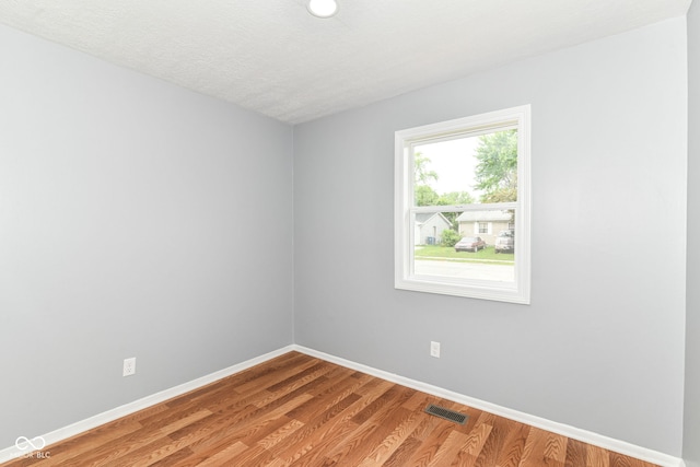 8445 Montery Rd, Indianapolis, IN 46226 - unfurnished room with baseboards and light wood finished floors