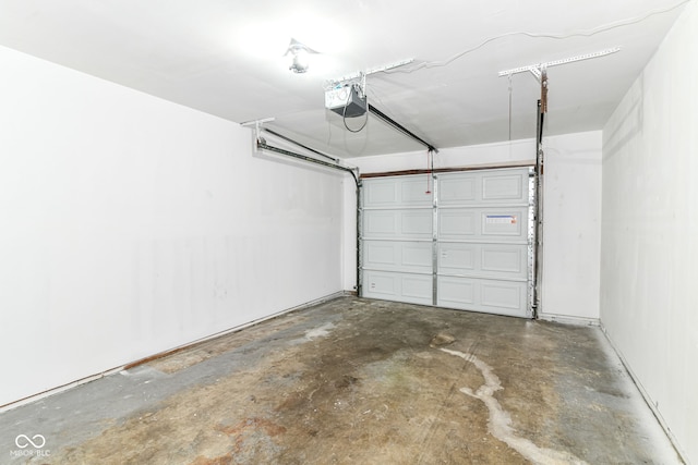 8445 Montery Rd, Indianapolis, IN 46226 - garage featuring a garage door opener