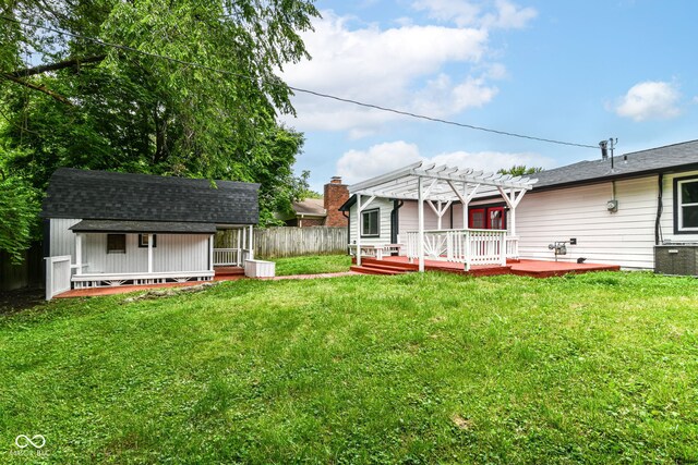 8445 Montery Rd, Indianapolis, IN 46226 - view of yard with a pergola, a wooden deck, and central air condition unit