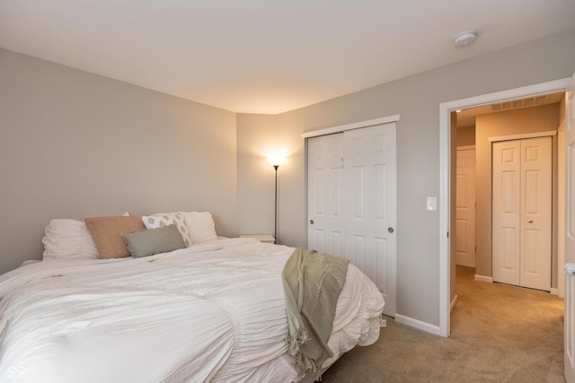 929 Capricorn Dr, Franklin, IN 46131 - bedroom featuring light colored carpet, a closet, and baseboards