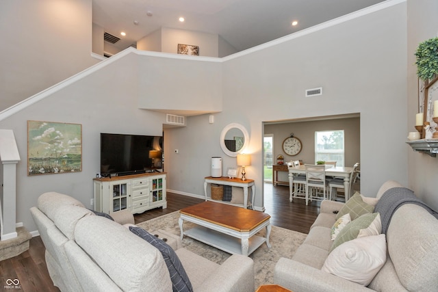 929 Capricorn Dr, Franklin, IN 46131 - living room featuring a high ceiling, wood finished floors, baseboards, and recessed lighting