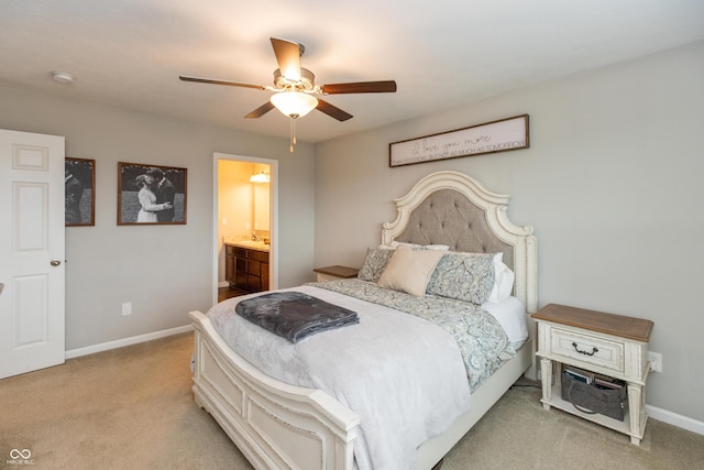 929 Capricorn Dr, Franklin, IN 46131 - bedroom featuring light colored carpet, baseboards, a ceiling fan, and connected bathroom
