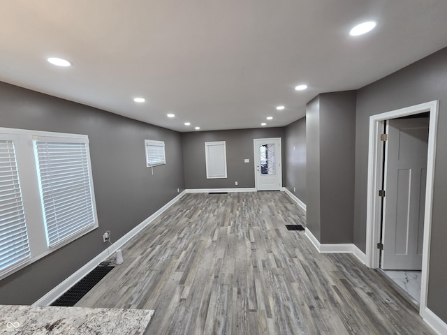 2035 S Pennsylvania St, Indianapolis, IN 46225 - basement with wood finished floors, baseboards, and recessed lighting