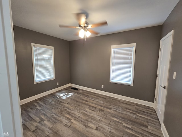 2035 S Pennsylvania St, Indianapolis, IN 46225 - unfurnished room featuring a ceiling fan, dark wood-type flooring, and baseboards