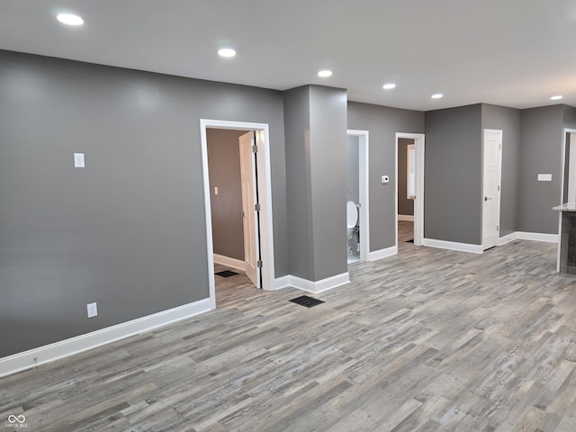 2035 S Pennsylvania St, Indianapolis, IN 46225 - spare room featuring wood finished floors, baseboards, and recessed lighting