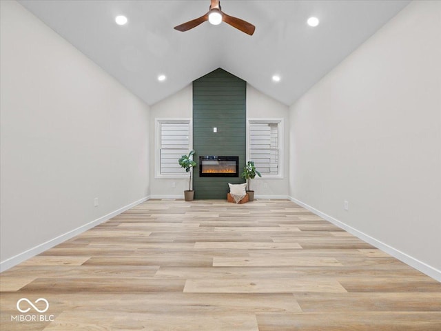 31 Mckenzie St, Shelbyville, IN 46176 - unfurnished living room featuring ceiling fan, a fireplace, recessed lighting, lofted ceiling, and baseboards