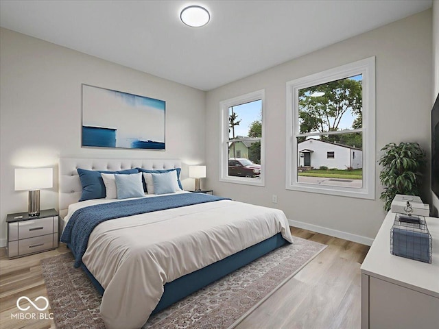 31 Mckenzie St, Shelbyville, IN 46176 - bedroom with light wood-type flooring and baseboards