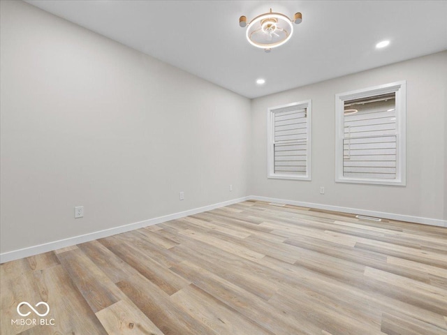 31 Mckenzie St, Shelbyville, IN 46176 - unfurnished room with light wood-type flooring, baseboards, and recessed lighting