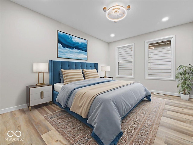 31 Mckenzie St, Shelbyville, IN 46176 - bedroom with baseboards, light wood-style floors, and recessed lighting