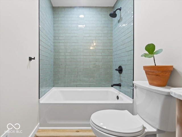 31 Mckenzie St, Shelbyville, IN 46176 - full bathroom featuring toilet, bathing tub / shower combination, wood finished floors, and baseboards