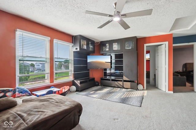 2887 Ludwig Dr, Indianapolis, IN 46239 - living room featuring carpet, a textured ceiling, and a ceiling fan