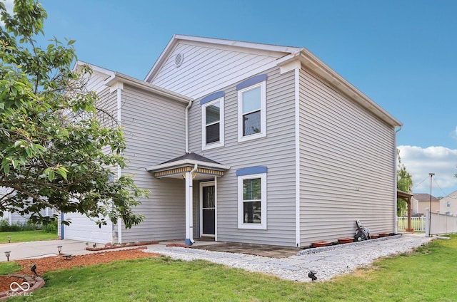 2887 Ludwig Dr, Indianapolis, IN 46239 - traditional-style house with concrete driveway and a garage