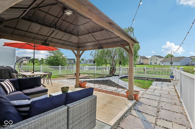 2887 Ludwig Dr, Indianapolis, IN 46239 - fenced backyard with outdoor lounge area, a patio, outdoor dining area, a gazebo, and a residential view