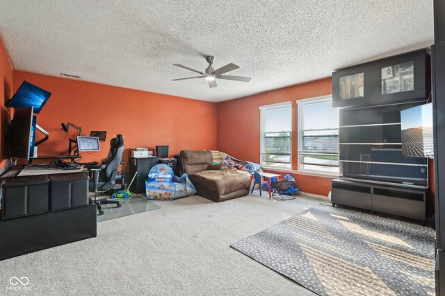 2887 Ludwig Dr, Indianapolis, IN 46239 - bedroom featuring carpet flooring, an office area, a ceiling fan, and a textured ceiling