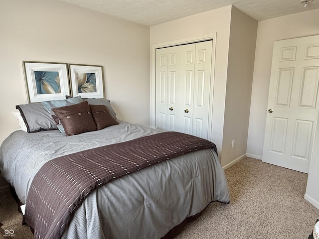 7042 Gavin Dr, Indianapolis, IN 46217 - carpeted bedroom with a closet and baseboards