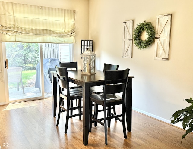 7042 Gavin Dr, Indianapolis, IN 46217 - dining space with wood finished floors