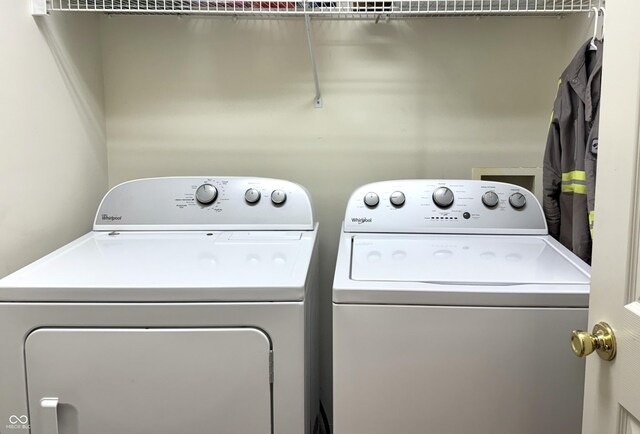 7042 Gavin Dr, Indianapolis, IN 46217 - laundry area with washing machine and dryer