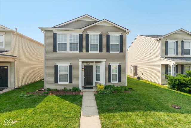 12671 Endurance Dr, Fishers, IN 46037 - view of front facade featuring a front yard and central air condition unit