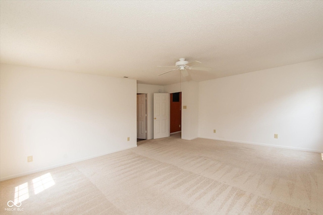 12671 Endurance Dr, Fishers, IN 46037 - empty room with ceiling fan, light carpet, and baseboards