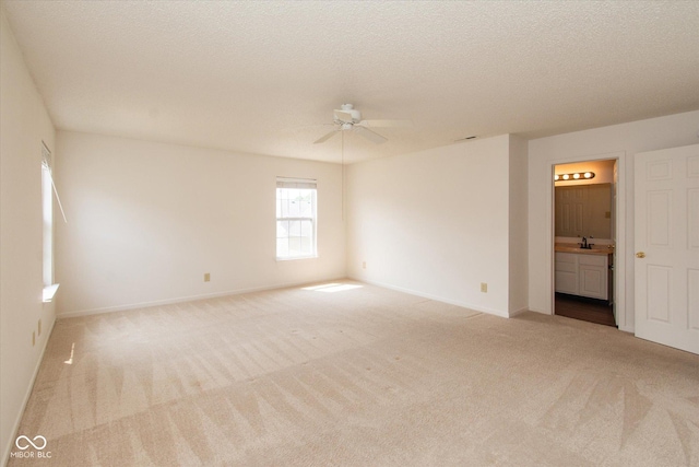 12671 Endurance Dr, Fishers, IN 46037 - empty room with ceiling fan, carpet floors, baseboards, and a textured ceiling