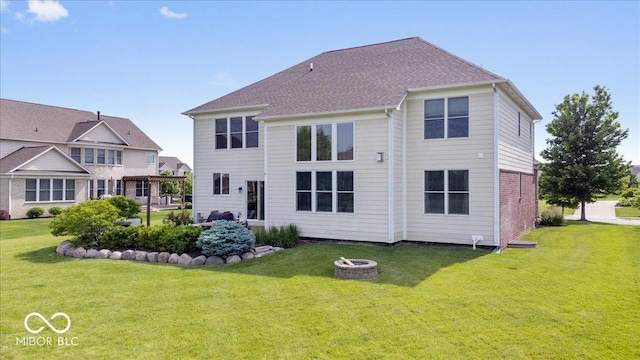 10054 Win Star Way, Fishers, IN 46040 - back of property featuring a lawn and a fire pit