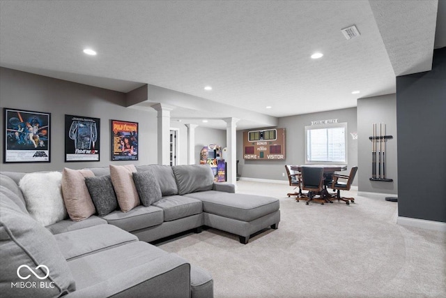 10054 Win Star Way, Fishers, IN 46040 - living area with decorative columns, light colored carpet, baseboards, recessed lighting, and a textured ceiling