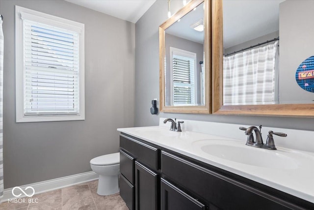10054 Win Star Way, Fishers, IN 46040 - full bath with toilet, double vanity, baseboards, and a shower with curtain