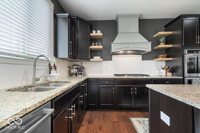 10054 Win Star Way, Fishers, IN 46040 - kitchen featuring open shelves, a sink, custom exhaust hood, stainless steel appliances, and backsplash