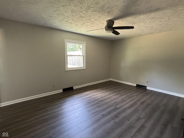 4343 W Fairview Rd, Greenwood, IN 46142 - empty room with a ceiling fan, dark wood-style flooring, and a textured ceiling