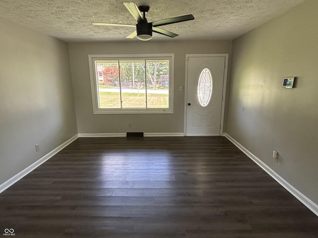 4343 W Fairview Rd, Greenwood, IN 46142 - foyer featuring dark wood-type flooring, a textured ceiling, and ceiling fan
