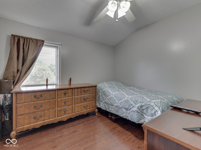 730 N Forsythe St, Franklin, IN 46131 - bedroom with dark wood-type flooring, vaulted ceiling, and ceiling fan