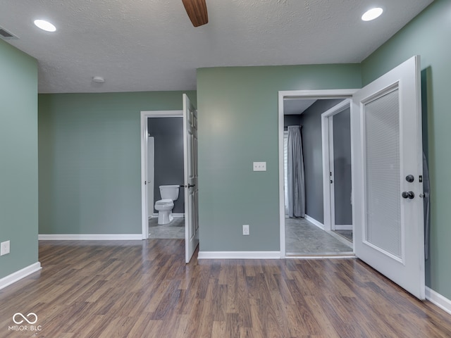 730 N Forsythe St, Franklin, IN 46131 - unfurnished bedroom featuring baseboards, wood finished floors, recessed lighting, a textured ceiling, and a closet